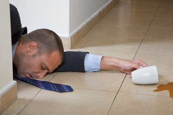 Man having seizure in office.