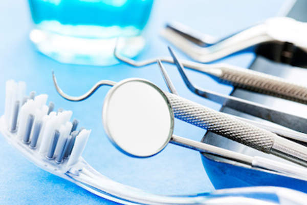 toothbrush and dental tools, dentist can diagnose and treat diseases causing bad breath.