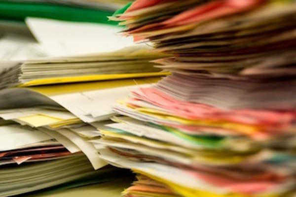 Stack of files, always more to do.
