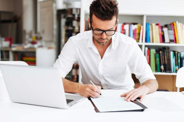 Man working at home at night.