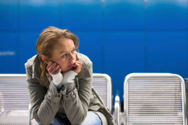 Depressed woman sitting alone.