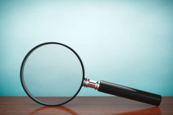 Magnifying glass investigating