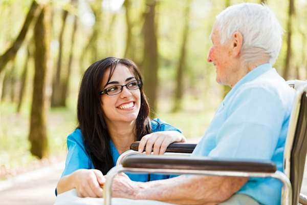 Nurse caring for senior.
