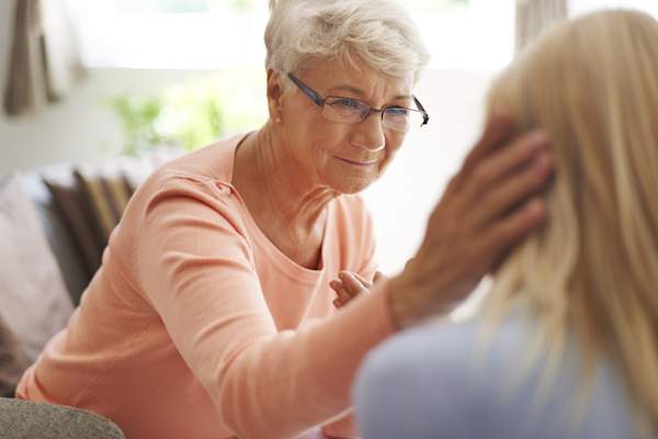 Senior woman and caregiver.