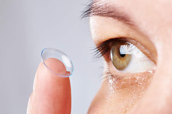 Woman with contact lens inside out.