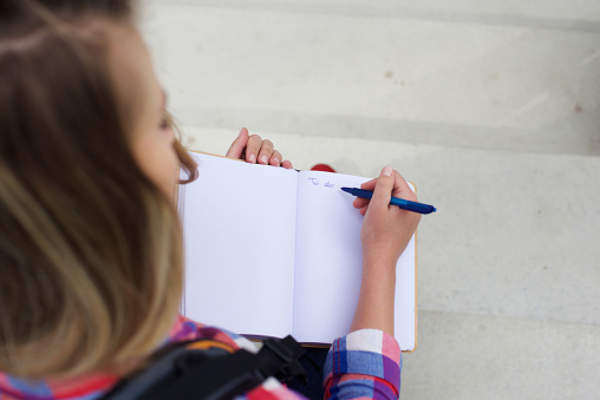 Student scheduling her day.