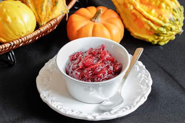 A serving dish of crushed cranberry sauce.