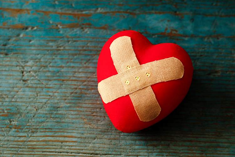 Hurt heart with a bandage.