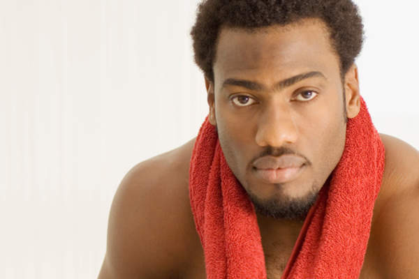 Shirtless man with towel