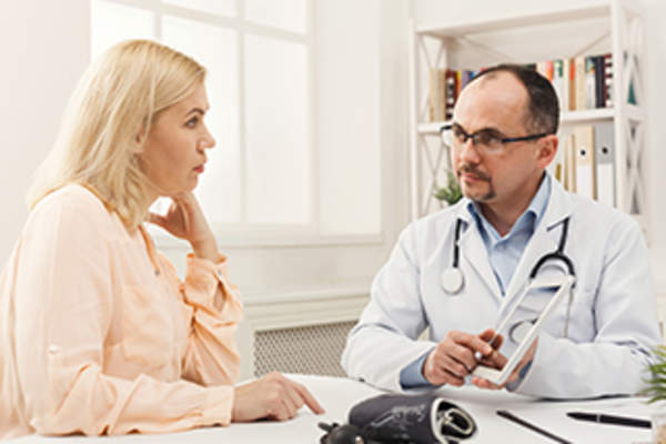 Doctor explaining diagnosis.