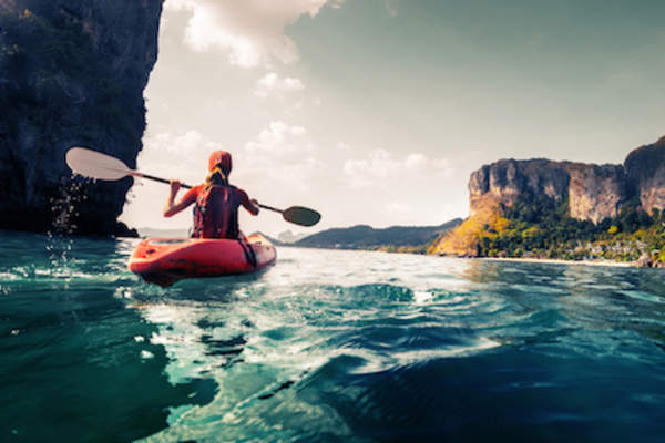 Woman kayaking.