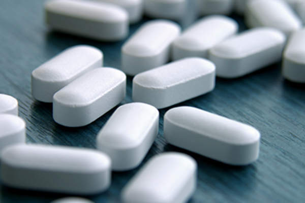 White pills.