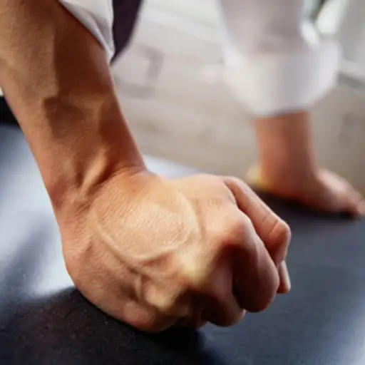 man hitting table image