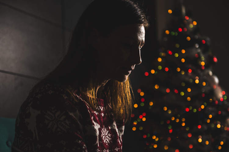 Depressed woman at christmas time.