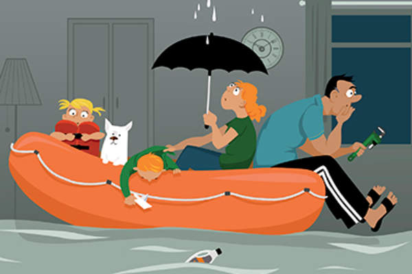 Family in a flooded house.