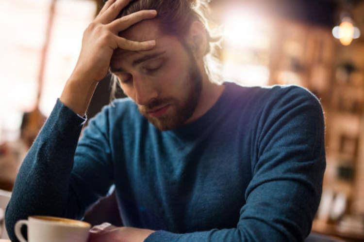Man with headache.