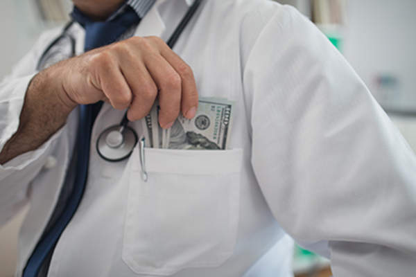 Fraud doctor pocketing money.