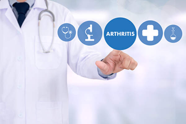 Doctor making an arthritis diagnosis on smartboard.