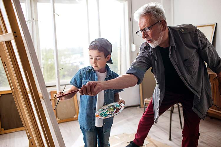 Grandfather and grandson painting