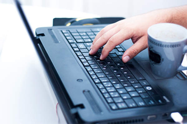 Man using laptop.