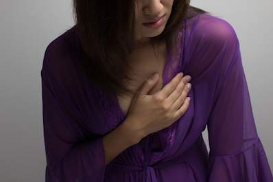 Woman having chest pain.