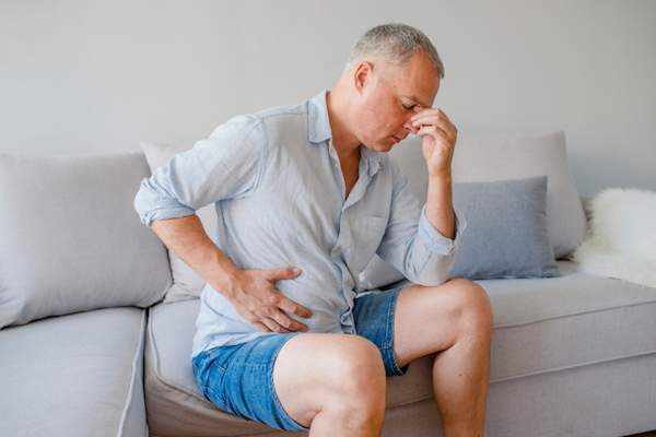 Man with abdominal swelling.