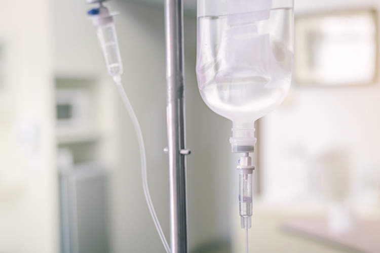 IV drip and pole in hospital.