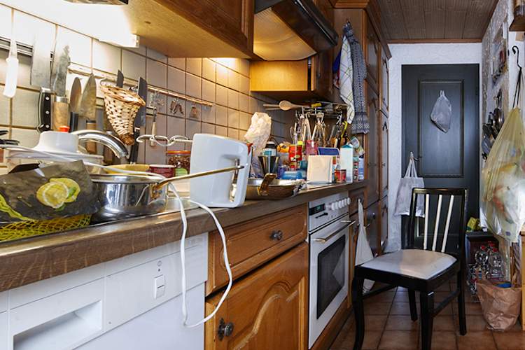 Messy, cluttered kitchen.