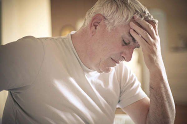 Fatigued senior man.