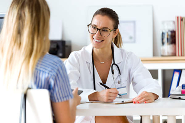 Doctor talking to a patient.