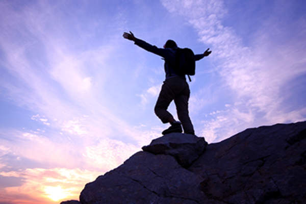 Person holding their arms in the air.