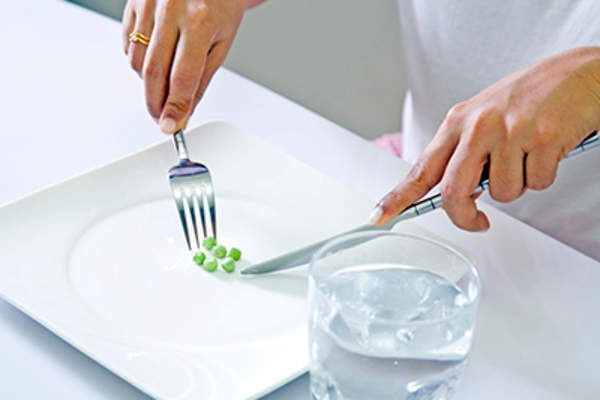 Fasting concept, eating little, drinking water.