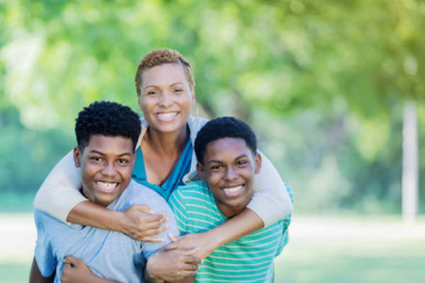 A mother and her two boys.