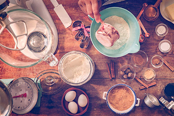 Ingredients and baking utensils for baking Christmas cookies.