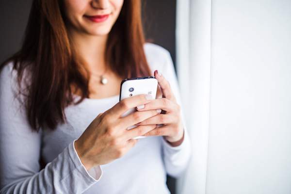 woman using cell phone