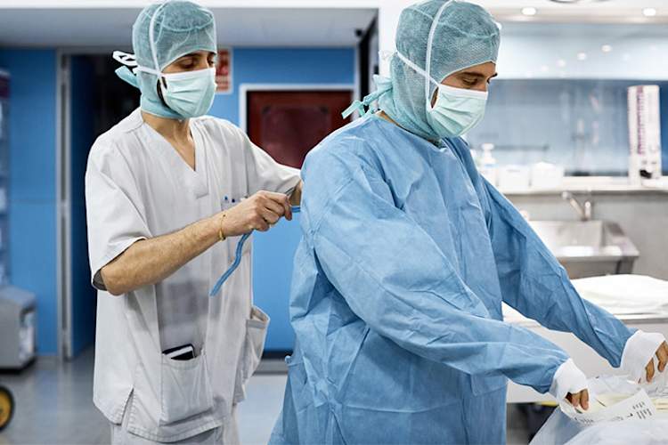 Doctors preparing for surgery.