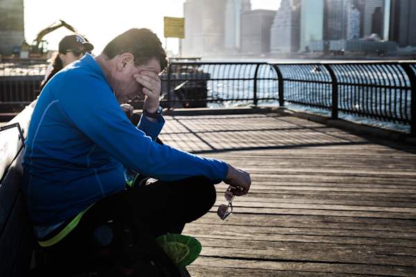 tired man on bench