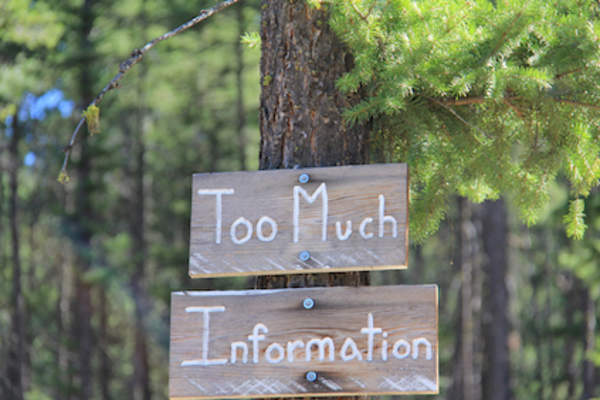 Signs reading "Too Much Information"