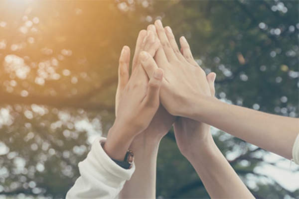High fives in support.