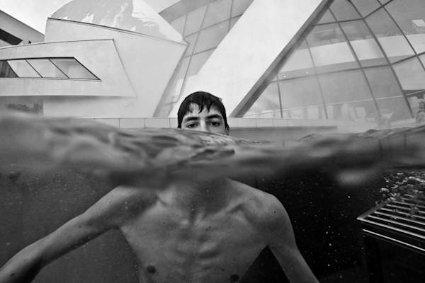 young man partially under water