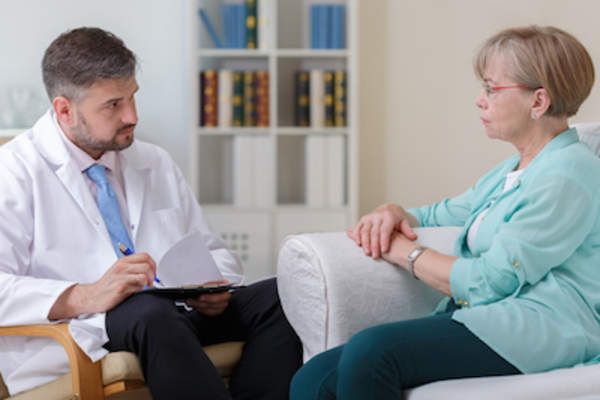 Older woman talking to therapist