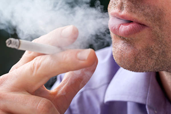 Smoking a cigarette