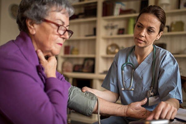 Woman with stress and high blood pressure.