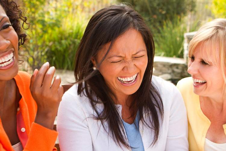 Laughing with other caregivers.