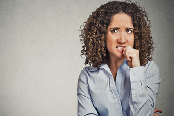 Woman with self-doubt, no confidence.