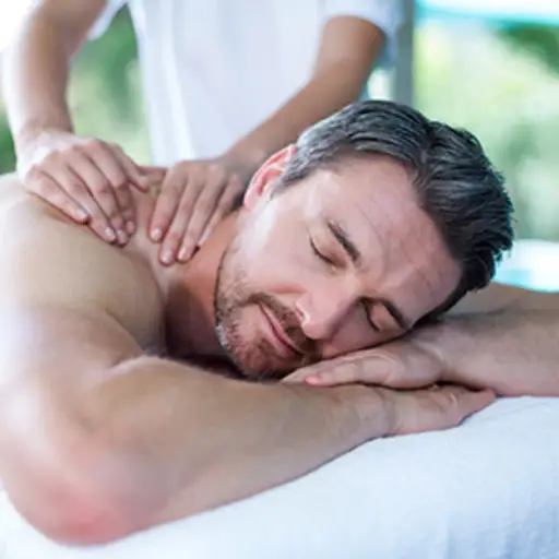 Man receiving a back massage.