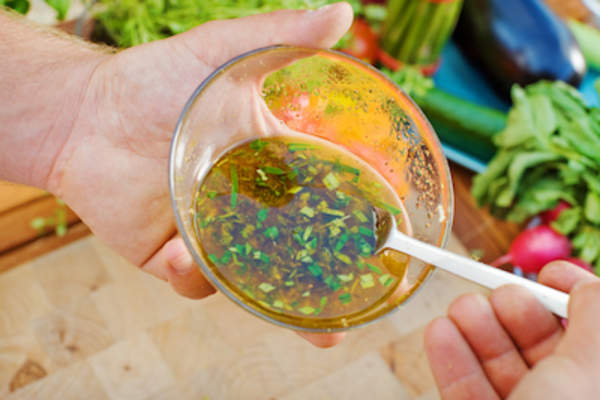 Man whipping up a marinade
