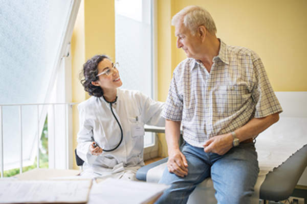 Doctor talking to a senior patient.