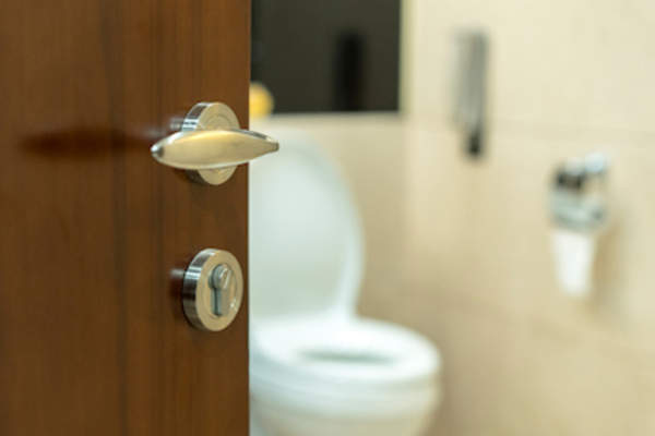 Door to private dorm bathroom.