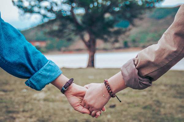 couple holding hands